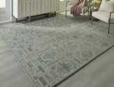 Bay Furniture Gallery - Ashley Furniture - Jossland Rug - 5' x 7' Rug / Green/Ivory - R406912
